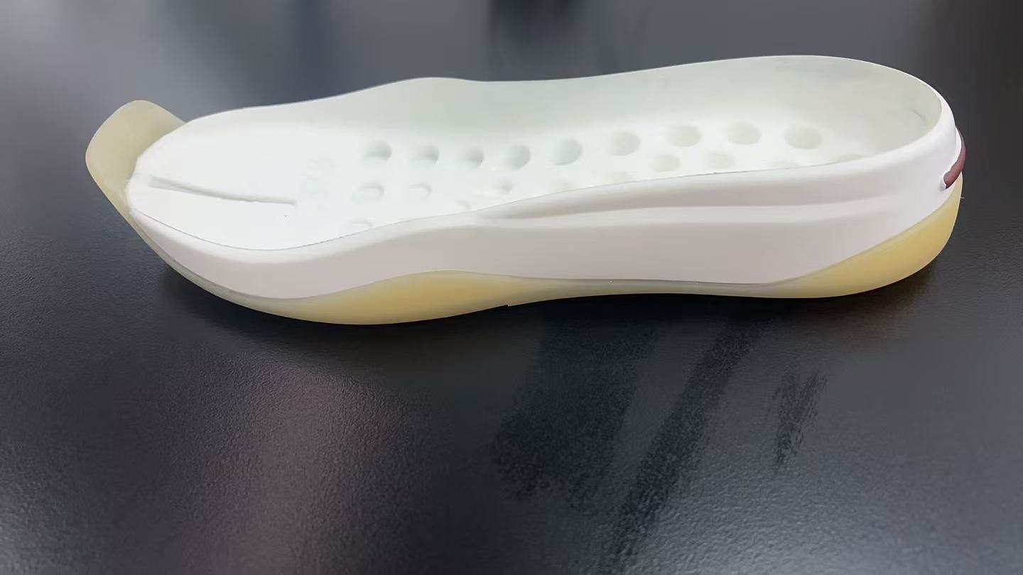 PU and PVC vacuum-molded sole material and construction example