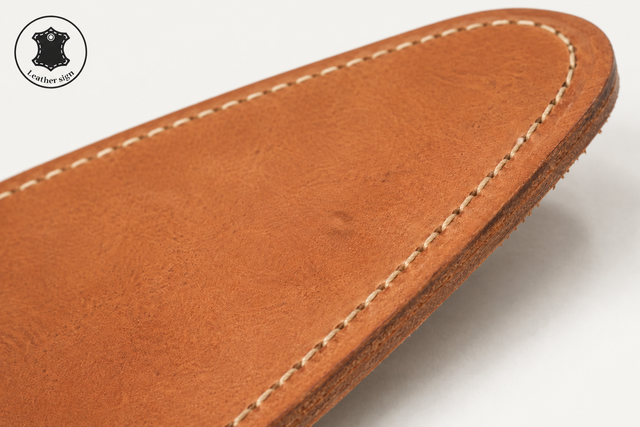 Close-up of leather sole edge texture and stitch detail